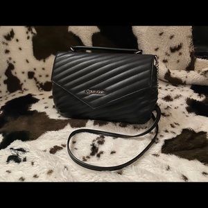 Calvin Klein black quilted bag.